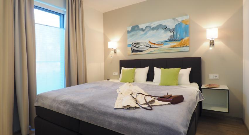 Schlafzimmer mit Badezimmer en suite