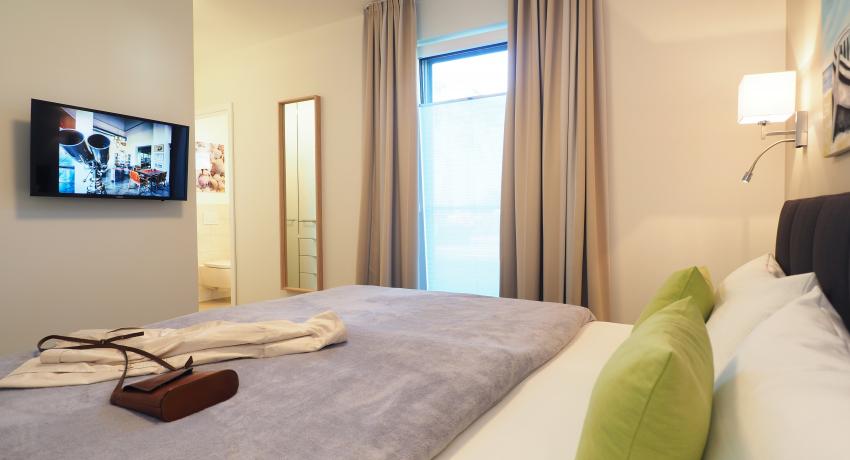 Schlafzimmer mit Badezimmer en suite