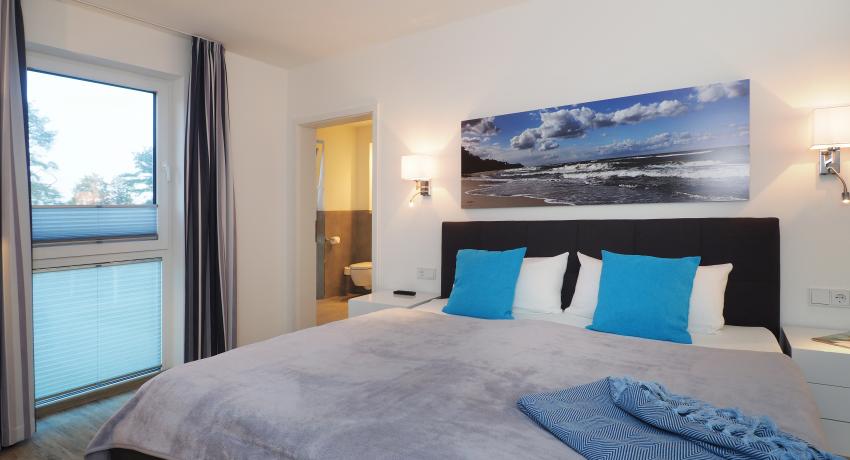 Schlafzimmer mit Badezimmer en suite